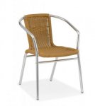 Stackable outdoor armchair made of polypropylene in honey color
