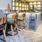 Preview: Barhocker "Studo" aus schwarzem Kunstleder und Gestell aus Eiche und Metall