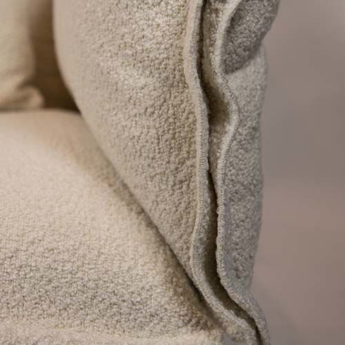 "Floral" armchair made of beige teddy boucle and black metal frame