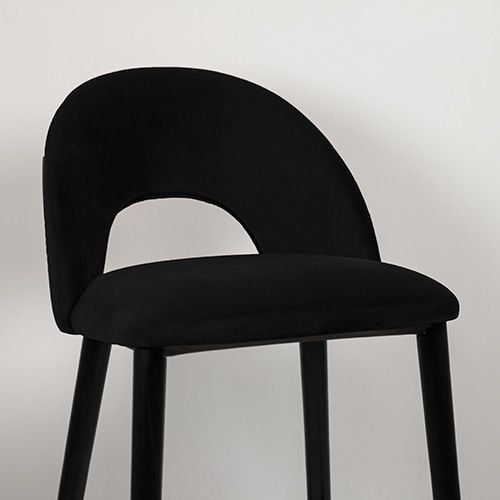 "Jyll" bar stool made of black velvet and legs made of black solid beech