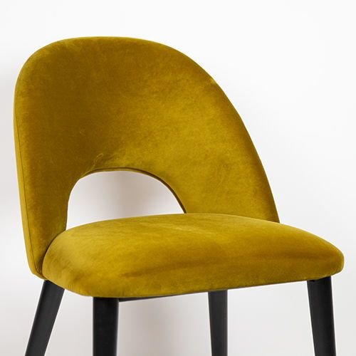 "Jyll" chair made of yellow gold velvet and legs made of black solid beech