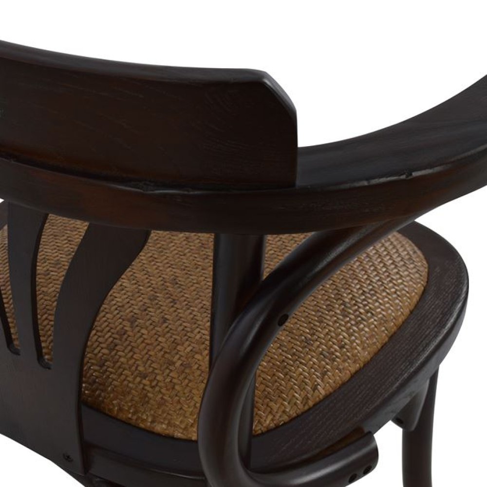 Wooden chair antique with straw seat in brown color