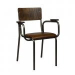 "Skool" armchair made of metal frame with backrest made of oak and seat made of synthetic leather