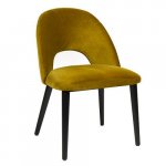 "Jyll" chair made of yellow gold velvet and legs made of black solid beech